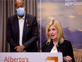 Alberta NDP Leader Rachel Notley, right, and David Shepherd, NDP Opposition health critic, respond to a COVID-19 update from Premier Jason Kenney, Health Minister Tyler Shandro and Alberta chief medical officer of health Dr. Deena Hinshaw during a press conference at the Federal Building in Edmonton on Nov. 12, 2020.