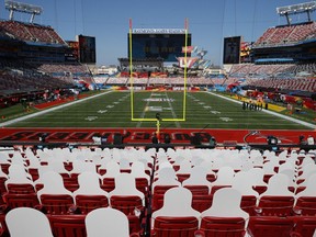Cut-out photographs of fans fill some of the seats to maintain social distancing due to the coronavirus disease at Raymond James Stadium for Super Bowl LV between the Kansas City Chiefs and the Tampa Bay Buccaneers in Tampa, Florida, U.S., February 7, 2021.