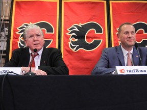 Brian Burke, then president of hockey operations with the Calgary Flames, announces Brad Treliving as the team's new GM at a press conference in this photo from April 2014.
