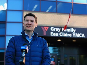 Calgary Ward 11 Councillor Jeromy Farkas speaks about his notice of motion calling on city council to enter talks with the YMCA to save the Eau Claire YMCA. Farkas spoke outside the Eau Claire YMCA on Wednesday, Feb. 24, 2021.