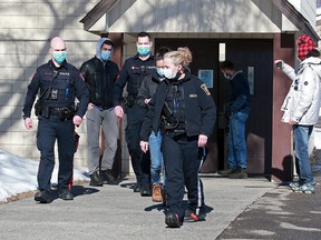 Calgary police, city bylaw and an Alberta Health Services official visited Fairview Baptist Church during a service on Sunday, Feb. 28, 2021.