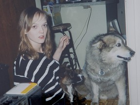 Murder victim Tara Landgraf is seen in this undated family photo with her family husky/wolf cross Saint.