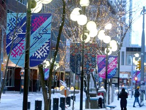 Banners promoting Chinook Blast, an outdoor midwinter round-up, are seen hanging along 3rd St. SW. Sunday, Feb. 7, 2021.