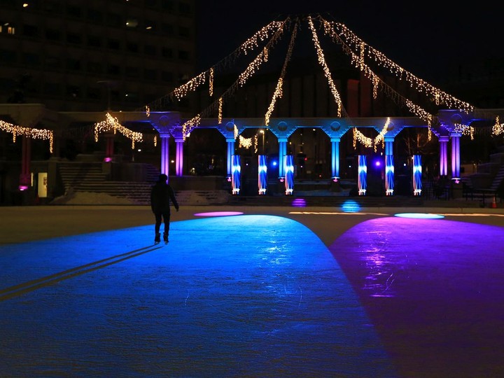  A lone skater checks out the lights of Chinook Blast at Olympic Plaza in Calgary on Saturday, February 13, 2021.Gavin Young/Postmedia