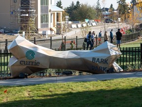 A contemporary dog bone sculpture that reaches about six feet tall and 15 feet wide serves an entry feature for the Currie Bark Park.