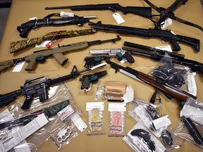 Firearms seized during an RCMP-ALERT drug trafficking investigation in Red Deer.