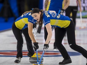 Team Alberta second Taylor McDonald sweeps during action at the Scotties Tournament of Hearts in Calgary.