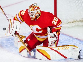 Feb 9, 2021; Calgary, Alberta, CAN; Calgary Flames goaltender Jacob Markstrom (25) makes a save against the Winnipeg Jets during the first period at Scotiabank Saddledome. Mandatory Credit: Sergei Belski-USA TODAY Sports ORG XMIT: IMAGN-445111