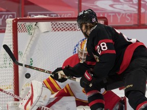 Ottawa Senators winger Connor Brown scores against Calgary Flames goalie David Rittich in the second period at the Canadian Tire Centre.