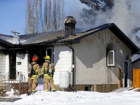 Calgary fire work on a house fire on 99ave. and 2nd str. S.E. in Calgary on Saturday, February 27, 2021.