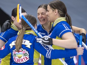 Team Alberta skip Laura Walker, third Kate Cameron (R), second Taylor McDonald (L) and lead Rachel Brown (C-R) win the tiebreaker and head to the semi-finals, the Scotties Tournament of Hearts 2021, the Canadian Women's Curling Championship.



Special to Postmedia /Andrew Klaver /POOL