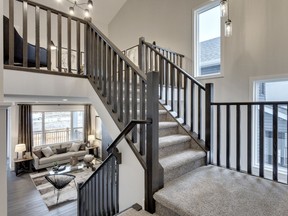 The stairs in the Monroe show home by Trico Homes in Seton.
