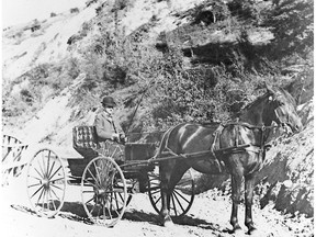 A horse-drawn carriage makes it through Mission Hill in the early 1900s. Horsepower helped transition to fossil fuel power, says columnist John Ellis.