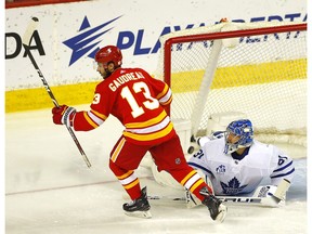 Calgary Flames winger Johnny Gaudreau scores on Toronto Maple Leafs goalie Frederik Andersen in this photo from Jan. 26.