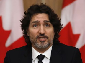 Prime Minister Justin Trudeau speaks at a news conference in Ottawa on Tuesday, Feb. 16, 2021, about new gun control measures.