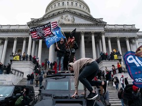 Donald Trump's supporters protest outside the U.S. Capitol in Washington on Jan. 6.