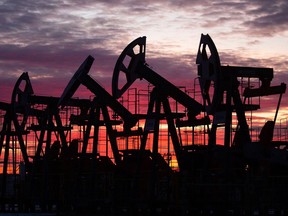 Oil prices edged higher on Friday and were on track to post weekly gains, with demand growing faster than supply.