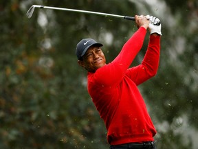 Tiger Woods tees off on the 4th hole during the final round of The Masters on Nov. 15, 2020.