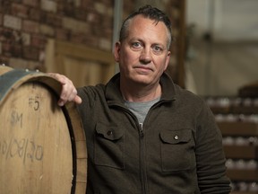 Two Rivers Distillery’s Mark Freeland poses for a photo at his distillery in southeast Calgary on Wednesday, March 3, 2021. Freeland is concerned the province’s plan to allow large booze makers to buy favours from liquor stores would leave small producers out of the competition.
