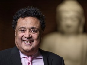 Mainstreet Equity Corp founder, president and CEO Bob Dhillon poses for a photo at the Buddha room in his office building in Calgary on Friday, March 19, 2021. Azin Ghaffari/Postmedia