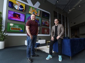 Mike Lowe, left, and Neil Gruninger, Kidoodle.TV founders, pose for a photo at their office in Calgary on Thursday, March 25, 2021.
