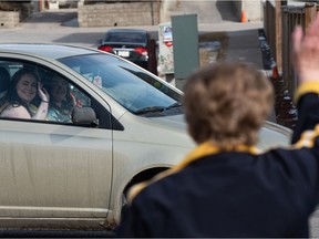 Helen Jusic has been bringing smiles to the community by spreading love at this four-way stop in Bridgeland since the start of the pandemic.