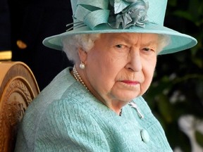 Britain's Queen Elizabeth attends a ceremony to mark her official birthday at Windsor Castle in Windsor, Britain, June 13, 2020.