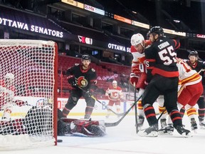 Milan Lucic scores for the Calgary Flames at Canadian Tire Centre on March 1, 2021, in Ottawa. Columnist Catherine Ford says legal single-game betting is just another government attempt to fleece gamblers.