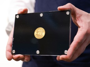 The only privately owned 1933 Double Eagle 20-dollar gold coin is on display at Sotheby's during a press preview for Sotheby's Auction Of The Three Treasures - Collected By Stuart Weitzman on March 11, 2021 in New York City.