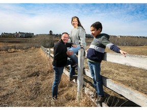 Jose Campo, Maricely Morillo and their son, Samuel Campo, 9, love the Springbank Hill community and are looking forward to their Wildflower townhome.