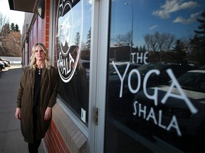 Dana Blonde, owner of Yoga Shala, stands outside her location in northwest Calgary on Monday, March 8, 2021. The COVID-19 pandemic has been rough on her business and she is in an ongoing fight with her landlord.