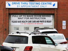 Cars line up at the COVID-19 drive-thru testing site at the Richmond Road Diagnostic and Treatment Centre on Wednesday, March 24, 2021.