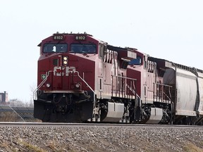 A train is seen along the tracks in Ogden. Canadian Pacific Railway has agreed to buy Kansas City Southern for US$25 billion. Sunday, March 21, 2021.