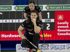 Calgary Ab,March 23, 2021.WinSport Arena at Calgary Olympic Park.Home Hardware Canadian Mixed Double Curling Championship.Laura Walker (Edmonton Ab), teams up with playing partner Kirk Muyres (Regina SK) during draw 28 against team Martin/Griffith.Curling Canada/ Michael Burns Photo