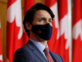 Canada's Prime Minister Justin Trudeau attends a news conference, as efforts continue to help slow the spread of the coronavirus disease (COVID-19), in Ottawa, Ontario, Canada March 19, 2021. REUTERS/Blair Gable ORG XMIT: GGG-OTW110