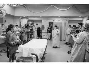 Dr. Katie Anker prepares the multidisciplinary team for a trauma patient arrival at Calgary's Foothills Medical Centre in February 2021. 
Photo by Dr. Heather Patterson; www.heatherpattersonphotography.com; Instagram@heather.l.patterson.