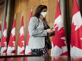 Auditor General Karen Hogan leaves a news conference in Ottawa, Thursday March 25, 2021.