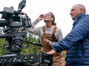 Actor/director Robin Wright, left, and director of photography Bobby Bukowski on the set of Land, a Focus Features release. Photo by Daniel Power, Focus Features.