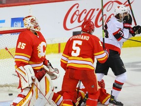 Calgary Flames goalie goalie Jacob Markstrom reacts after a goal by Colin White of the Ottawa Senators during NHL hockey in Calgary on Sunday March 7, 2021. Al Charest / Postmedia