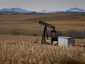 A de-commissioned pumpjack is shown at a well head on an oil and gas installation near Cremona, Alta., Saturday, Oct. 29, 2016. With oil prices climbing again, it's a good opportunity to tackle the growing problem of inactive wells, say columnists.