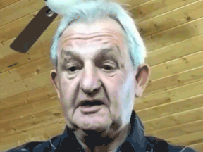 Darryl Sutter, hired back as head coach of the Calgary Flames, is shown in a Zoom call on March 5, 2021.