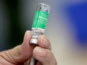 A medical worker prepares a dose of AstraZeneca COVID-19 vaccine in Linares, Mexico on Feb. 17, 2021.