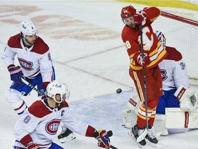 Calgary Flames Elias Lindholm tries to get out of the pucks way during the third period of a NHL game against Montreal Canadiens at Scotiabank Saddledome on Monday, April 26, 2021. Azin Ghaffari/Postmedia