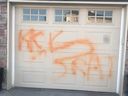Racist graffiti spray-painted on a garage door in the Royal Oak area. 