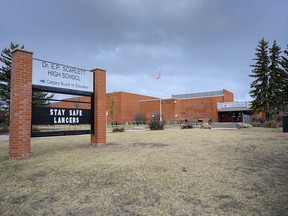 The exterior of Dr. E.P. Scarlett High School in Calgary on Thursday, April 8, 2021.