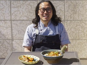 Kaede Hirooka, owner and chef of Respect the Technique, sits with two of his dishes in Calgary. Dre Kwong, Postmedia