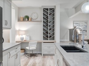 The kitchen in the Sunalta show home by Renova Homes and Renovations in Precedence in Riversong, Cochrane.