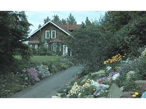 The residence of William Reader in the 1930s. The city built the home for the parks superintendent as part of the Reader Rock Gardens on the hill north of Union Cemetery. (Courtesy City of Calgary) DATE PUBLISHED AUG. 6, 2004. PAGE B7 * Calgary Herald Merlin Archive *