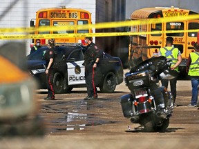 Calgary police investigate a workplace death in a school bus yard at First Student Canada in the Greenview Industrial area on Monday, April 5, 2021.
