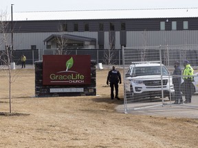 A fence has gone up around GraceLife Church and security is on scene to keep church members away on Wednesday, April 7, 2021.